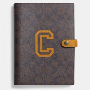📚 COACH NOTEBOOK IN SIGNATURE CANVAS WITH VARSITY MOTIF 📚 NWT 📚